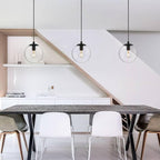 XiNBEi Lighting 8 inch Globe Pendant Lighting Kitchen Island, Modern Industrial Black Pendant Light with Clear Glass Adjustable Hanging Light Fixture for Dining Room XB-P1259-MBK