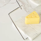 White Marble Cheese Board with Stainless Steel Slicer - Unique Grey Veining and Grooved Design White Marble Cheese Board, Cheese Cutting Serveware For Kitchen, 9.75" W x 8.5" D x 0.75" H