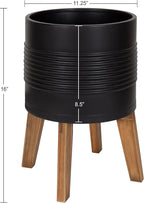 Kate and Laurel Gavri Farmhouse Freestanding Indoor Planter; 11.25 Inch Diameter; Black and Rustic Brown; Decorative Plant Stand with Wood Base and Iron Pot