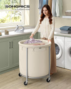 SONGMICS 63.5-Gallon (240 L) Laundry Basket with Wheels, Rolling Round Heavy-Duty Laundry Hamper Cart with Steel Frame and Removable Bag, 2 Locking Wheels, Cream White and Metallic Silver URLS012W01