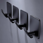DELITON 4 Pack Adhesive Hooks - Towel Hook for Hanging Towels, Clothes and Bags, Matte Black Stainless Steel, Stick on Wall for Bathroom and Kitchen