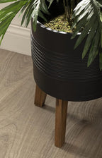 Kate and Laurel Gavri Farmhouse Freestanding Indoor Planter; 11.25 Inch Diameter; Black and Rustic Brown; Decorative Plant Stand with Wood Base and Iron Pot
