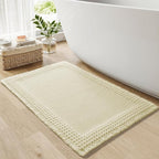 RESARE Waffle Bath Mat for Bathroom, Super Absorbent Bathroom Rugs Non Slip Machine Washable, Ultra Soft Quick Dry Boho Bath Rugs with Tassels for Floor, Upgraded Bordered Design, 18"x30" Cream