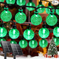 LORRYTE 2-Pack 100 LED Green Solar Christmas Lights Outdoor - 64FT Crystal Globe Waterproof Solar String Lights with 8 Lighting Modes for Christmas Decorations, Garden, Patio, Party, Porch