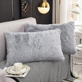 WERDIM Shaggy Faux Fur Pillowcases 2 Pack Button Closure Velvet Pillow Shams King Size (Light Grey, 20 X 36 Inches)
